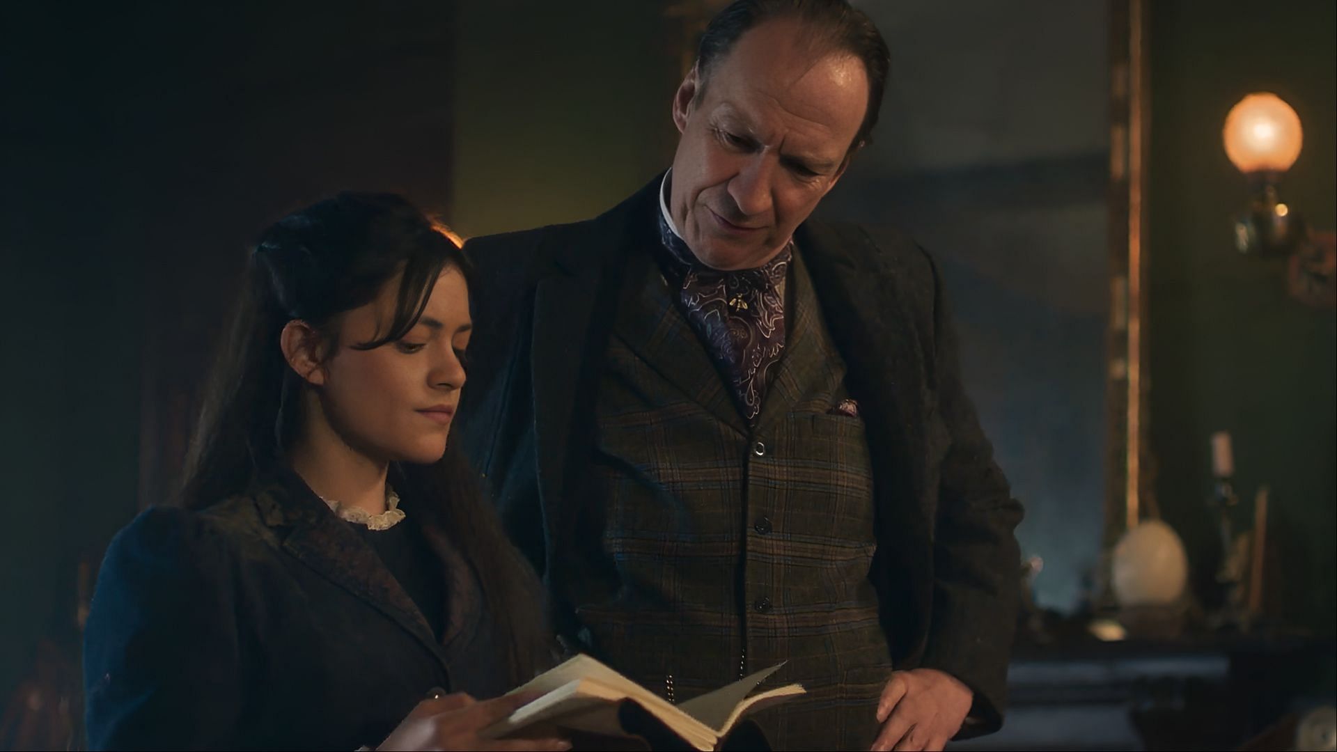 Amelia stands determined, her resolve unwavering as she dives deeper into the mystery in Sherlock & Daughter. (Image via CW)